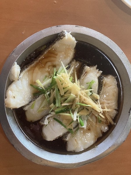 Steamed fish fillet in soy broth